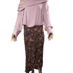 Outfit featuring a loose pink top and a brown floral midi skirt.