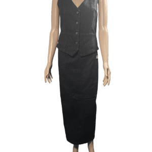 Mannequin dressed in a black vest and long skirt outfit.