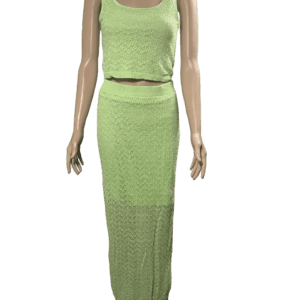 Green sleeveless crop top with matching long skirt.