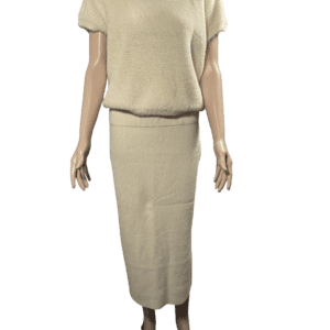 Beige knitted two-piece outfit with short sleeves and a long skirt.