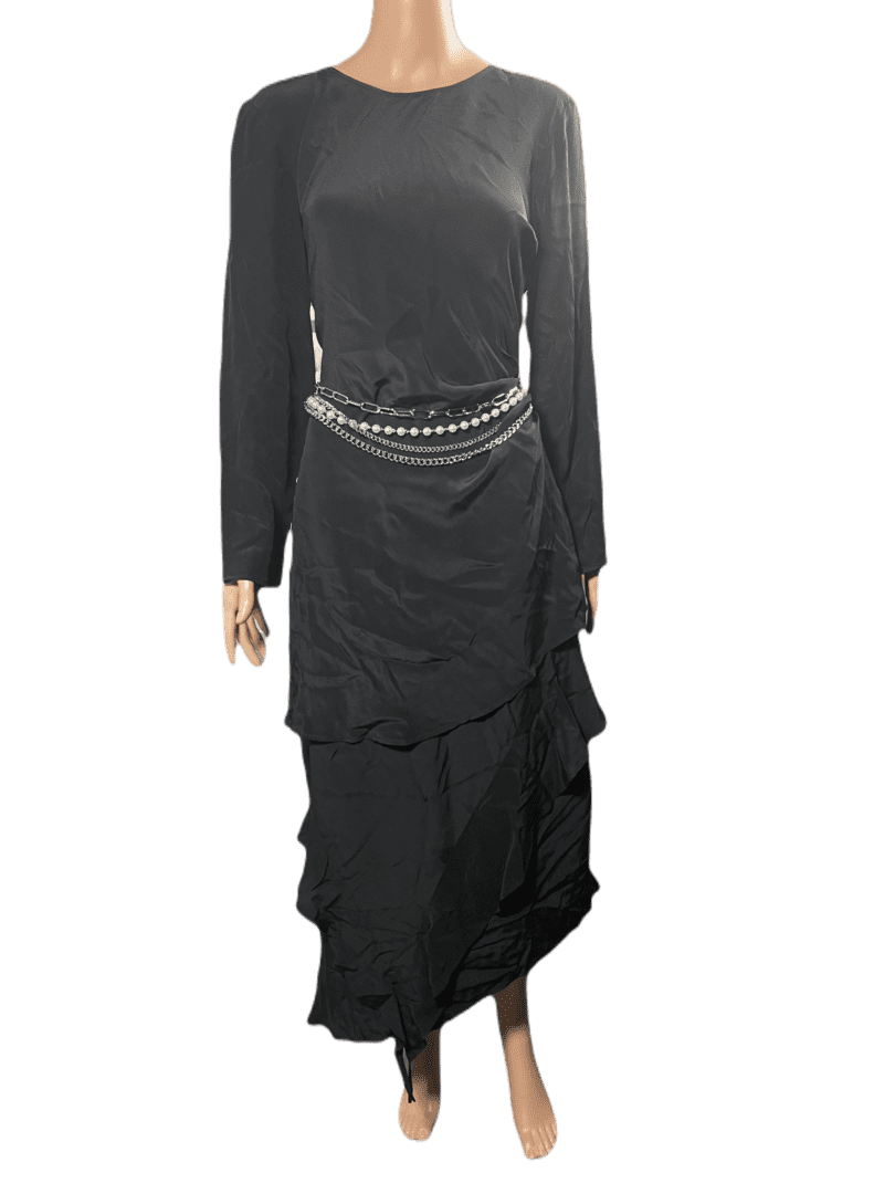 Elegant black dress with layered ruffles and a jeweled belt detail.