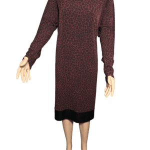 Long-sleeve, knee-length dress with a dark, intricate pattern.