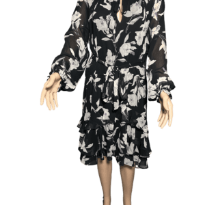 Black and white floral long-sleeve dress with a tiered skirt.