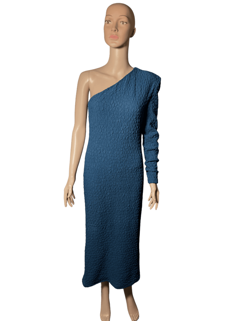A mannequin wearing a one-shoulder, long-sleeve blue dress.