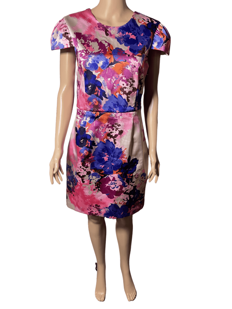 A colorful floral dress with vibrant pink, purple, and blue flowers.