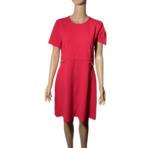 Woman wearing a simple red dress with short sleeves.