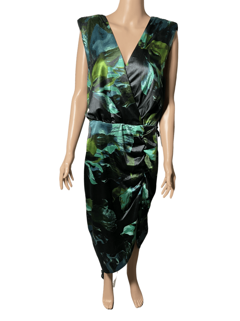 Sleeveless floral dress with a V-neck and belted waist on a mannequin.