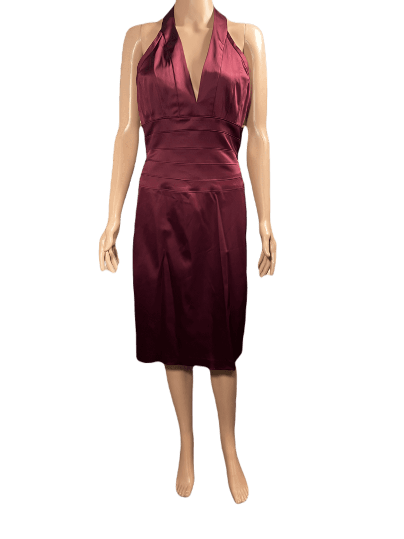 Sleeveless burgundy dress with a deep V-neck and knee-length hem.