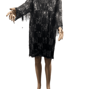 Person wearing a black sequined dress with long sleeves.