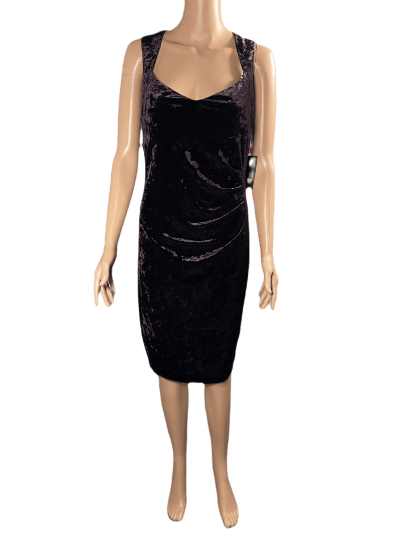 Elegant black velvet dress with thin straps.