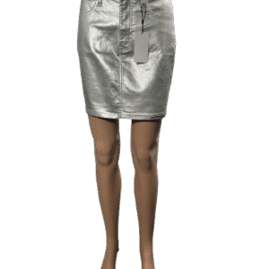 Woman wearing a shiny silver mini skirt.