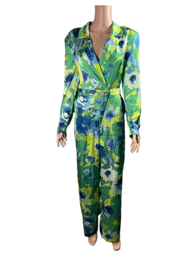 Long-sleeve floral jumpsuit with green and blue hues.