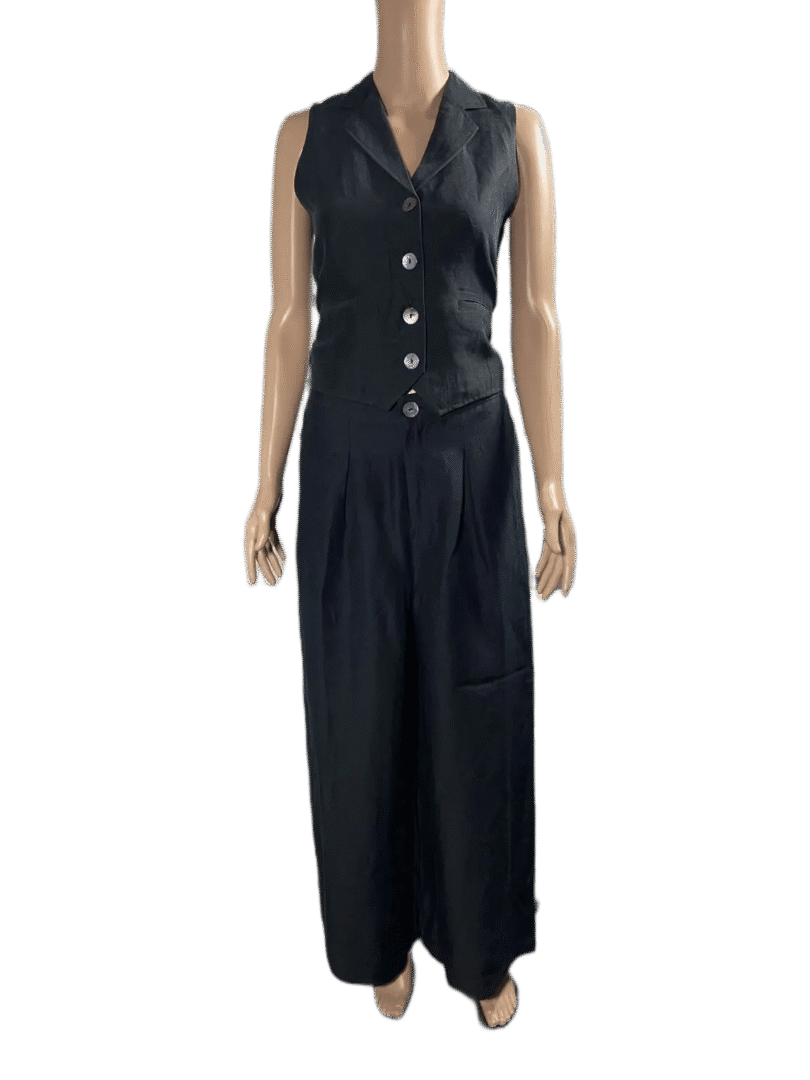 Black sleeveless jumpsuit with buttons and wide legs.