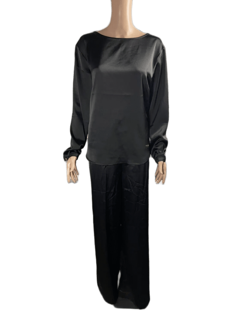 Black long-sleeve shirt and pants set on a mannequin.