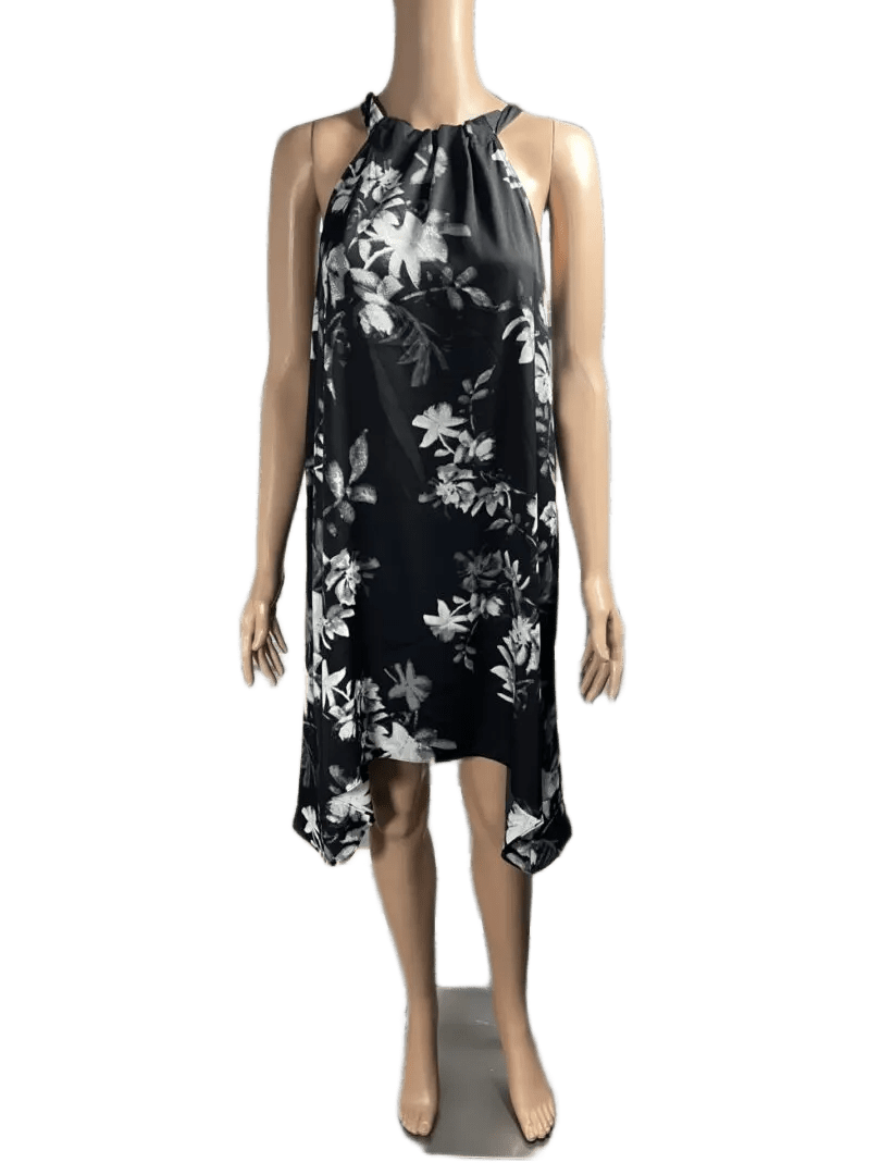Black floral sleeveless dress with an asymmetrical hem.