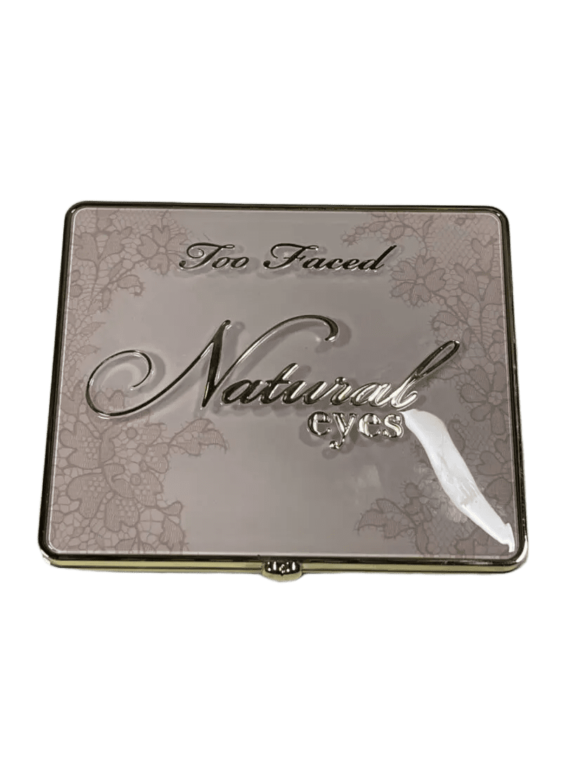 Too Faced Natural Eyes eyeshadow palette with a transparent cover.