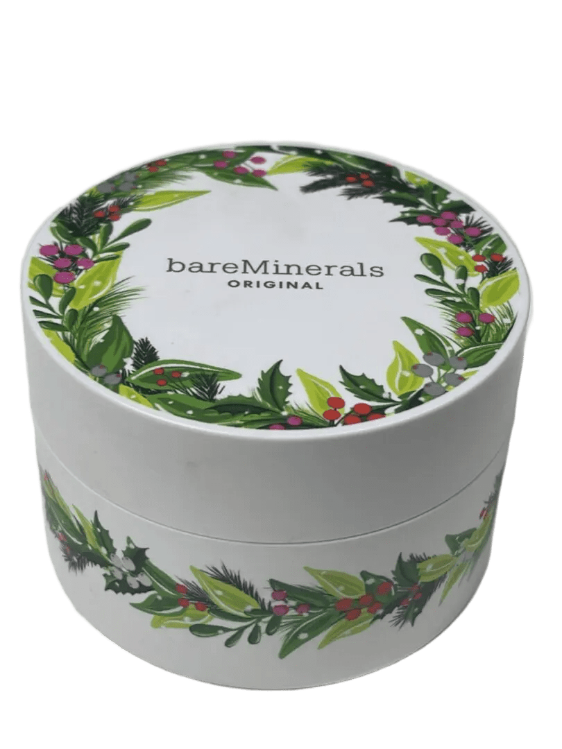 Round white container with green floral design labeled 'bareMinerals' cosmetic product.