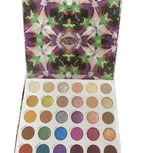 Open eyeshadow palette with a variety of colorful shades and a vibrant abstract cover.