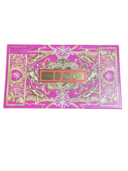 Ornate pink and gold decorative box with intricate patterns.