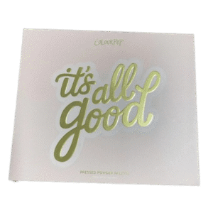 A pink card with gold foil text saying 'it's all good'.