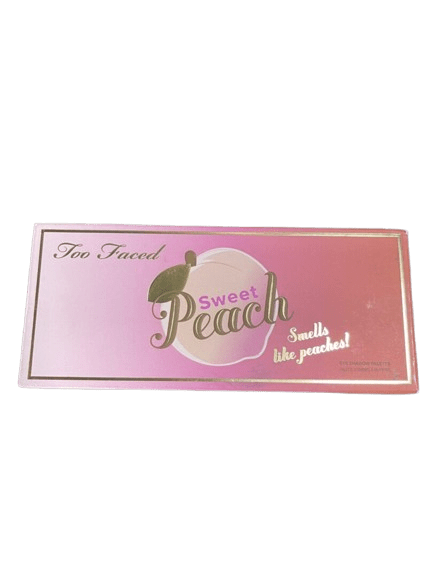 Too Faced Sweet Peach eyeshadow palette with peach-themed packaging.