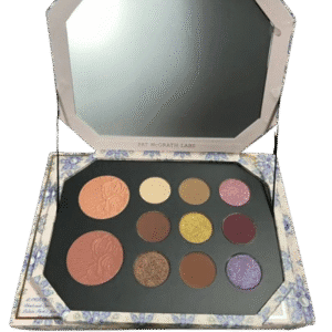 Open makeup palette with blushes, eyeshadows, and a mirror.