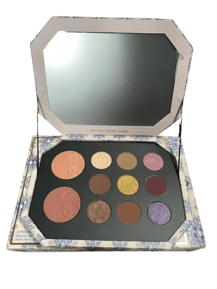 Open makeup palette with blushes, eyeshadows, and a mirror.