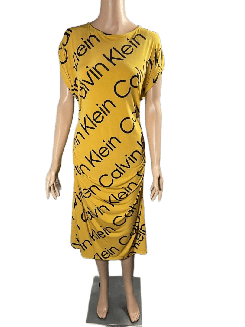Yellow Calvin Klein dress with black logo print and ruched details.
