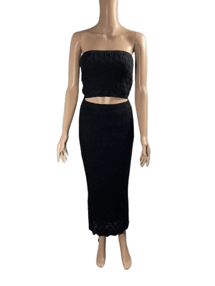 Elegant black two-piece dress with a strapless top and long skirt.
