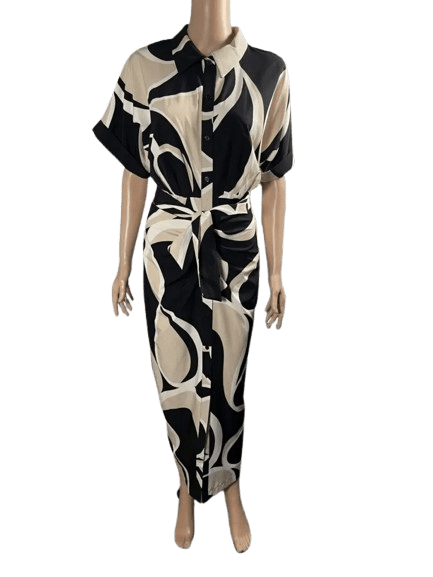 Stylish black and white abstract print dress with a cinched waist and short sleeves.