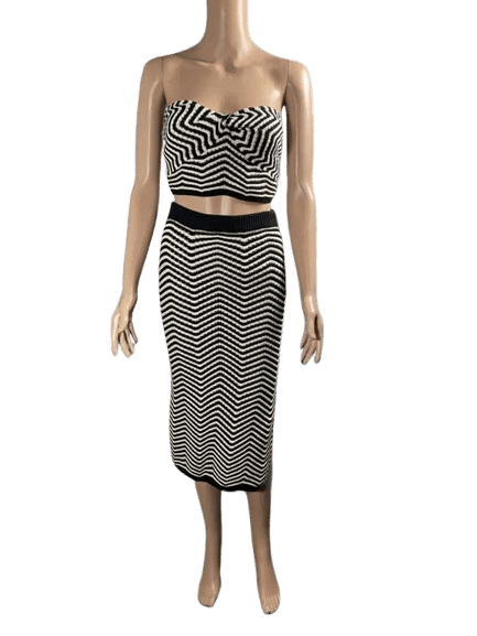 Black and white striped crop top and matching midi skirt outfit.