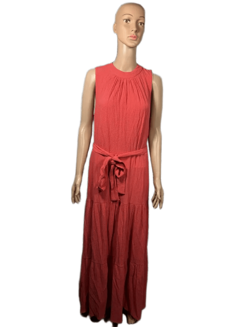 Sleeveless red maxi dress with a waist tie on a mannequin.