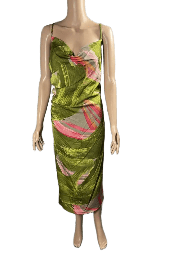 Green dress with dragon and floral design on a mannequin.