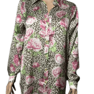 Long floral shirt with pink flowers and green leaves on a beige background.