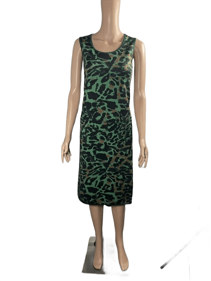 Sleeveless green and black patterned midi dress on a mannequin.