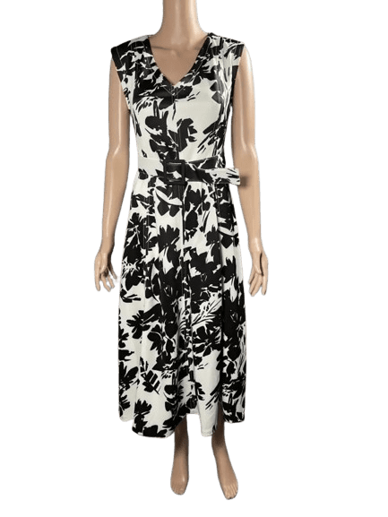 Black and white sleeveless patterned midi dress with a V-neck.