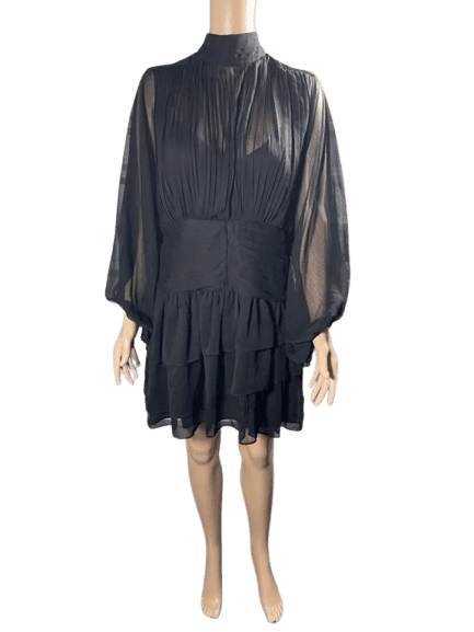 Elegant black chiffon dress with sheer long sleeves and tiered skirt.